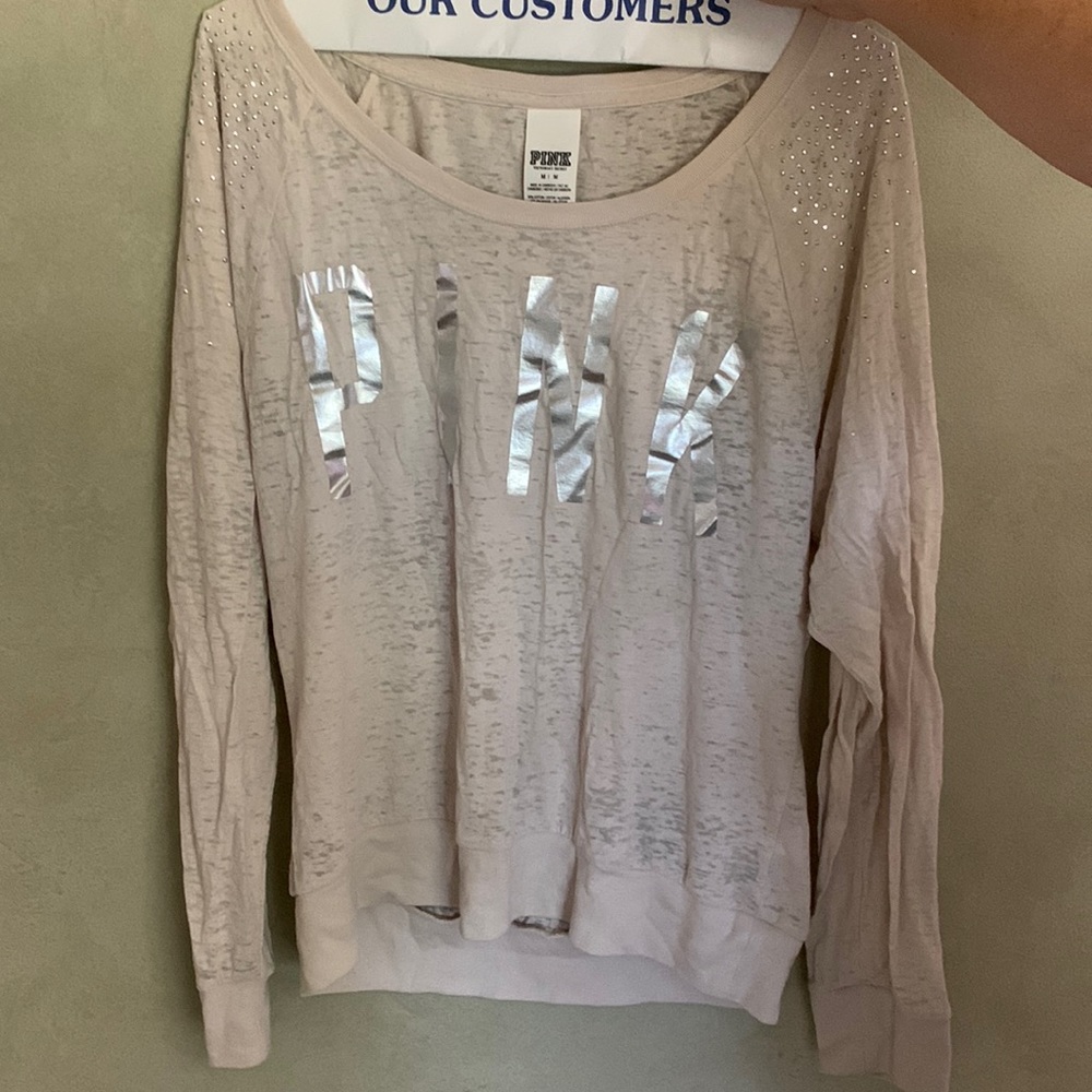 Pink long sleeved shirt